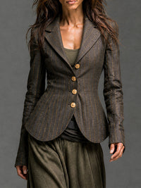 Veste sur mesure à rayures dorées sur fond charbon