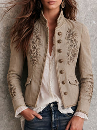 Veste rétro beige à col montant avec broderie florale et garniture tressée