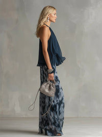 Marie | Ensemble élégant avec haut dos nu bleu marine et pantalon large imprimé